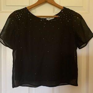 H&M, black sheer blouse with silver stars.